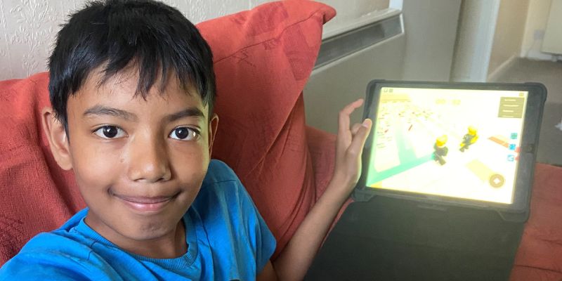 A boy with his device