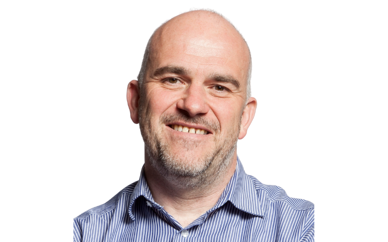 A portrait image of Dave Cook