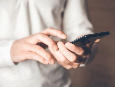 A person using a mobile phone