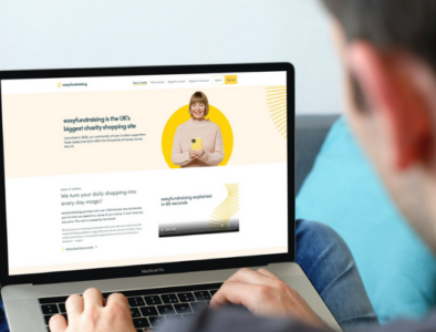 A man on a laptop shopping through easyfundraising on the screen